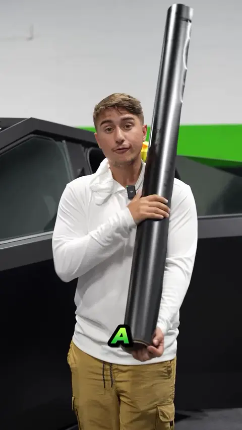 Divine Detailers explaining a matte black wrap and window tint on a Tesla Cybertruck