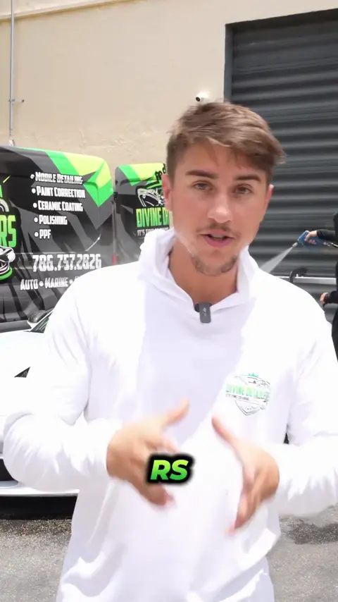 Divine Detailers explaining paint protection film and washing a white Porsche 911 GT3 RS