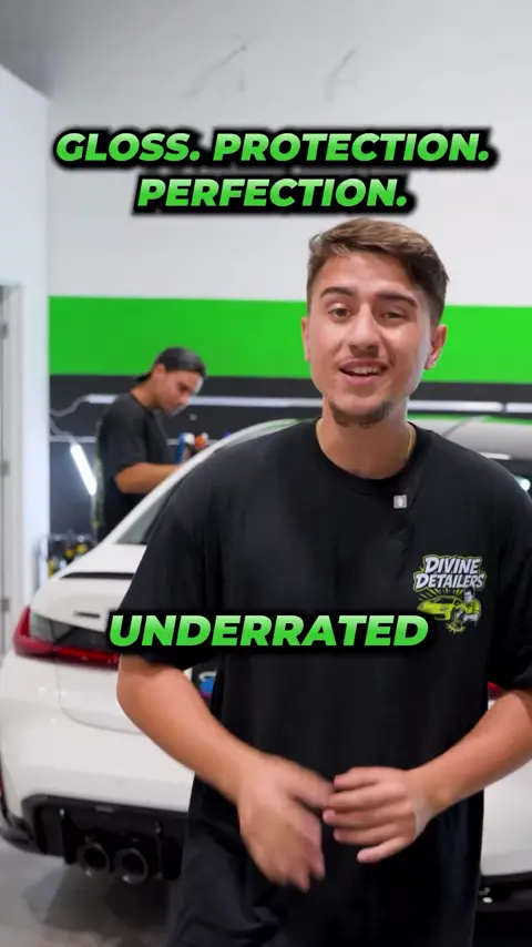 Divine Detailers explaining a ceramic coating on a white BMW M3