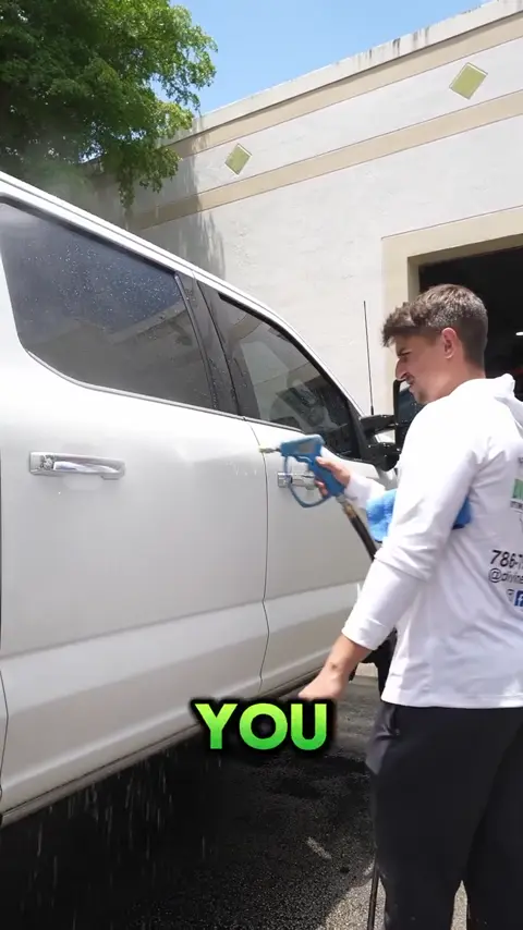 Divine Detailers explaining how a ceramic coating makes a white Ford Super Duty easier to rinse