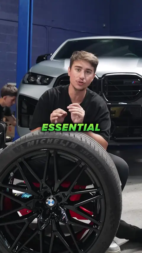 Divine Detailers explaining ceramic coating on BMW wheels and rims
